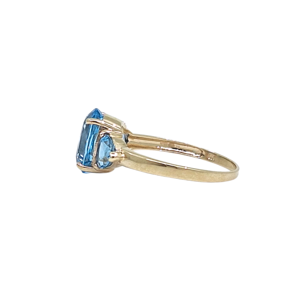 9ct Yellow Gold Blue Topaz Three Stone Ring