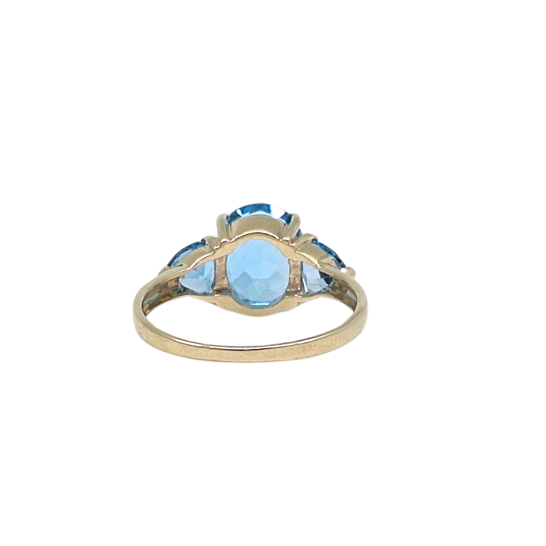 9ct Yellow Gold Blue Topaz Three Stone Ring