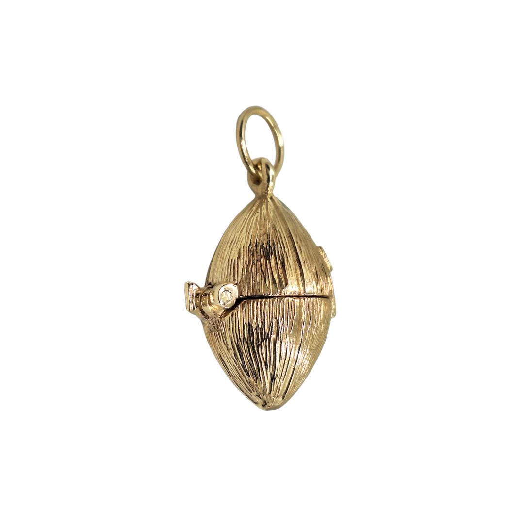 9ct Yellow Gold Cubic Zirconia Opening Rugby Ball Pendant
