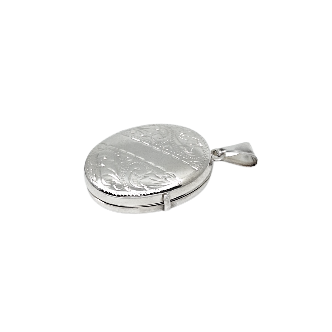 Silver Engraved Family Locket