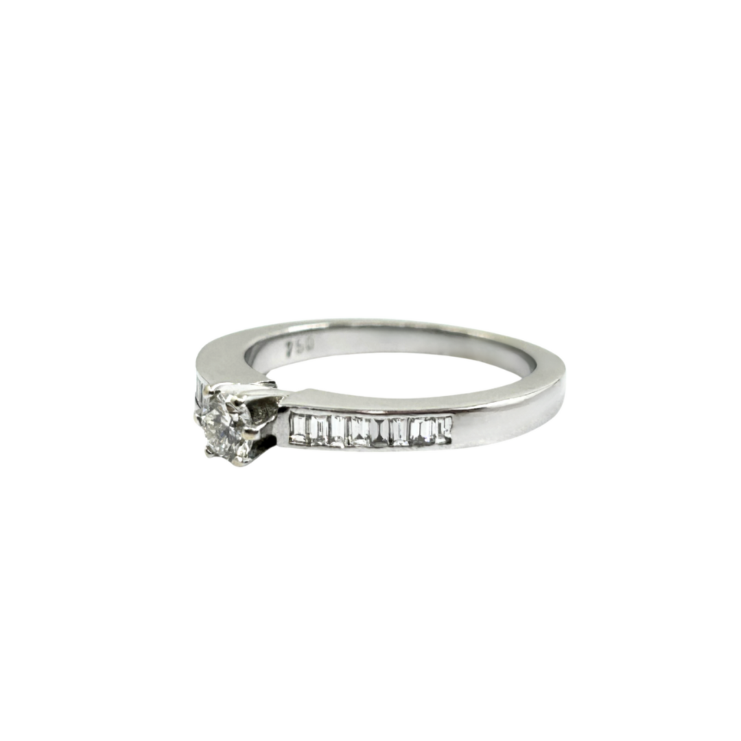 18ct White Gold Diamond Solitaire Ring With Baguette Diamond Shoulders