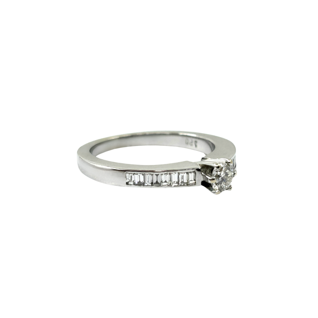 18ct White Gold Diamond Solitaire Ring With Baguette Diamond Shoulders