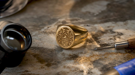 Close-up of engraved gold signet ring