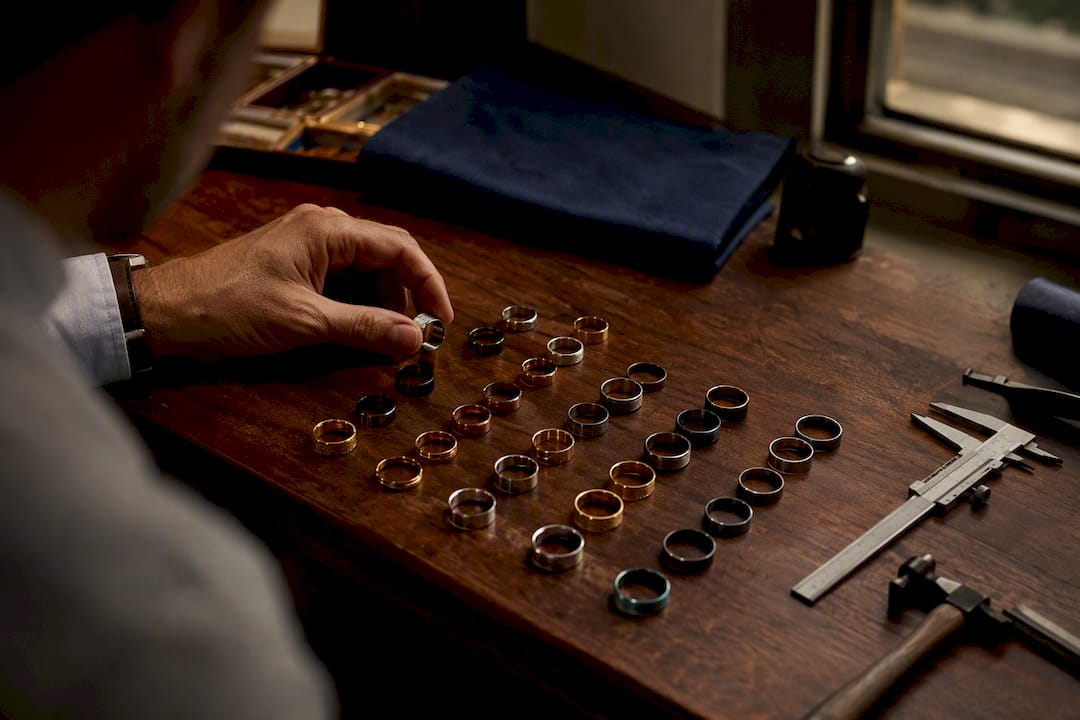 Close-up of men's wedding rings in various metals
