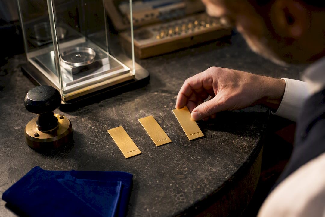 Gold samples beside hallmarking tools