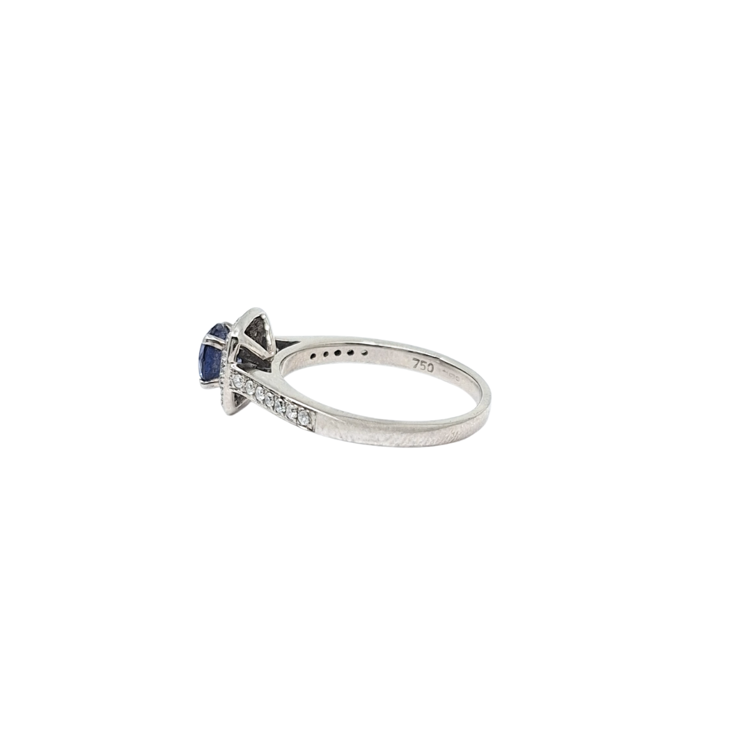 18ct White Gold Tanzanite & Diamond Halo Ring