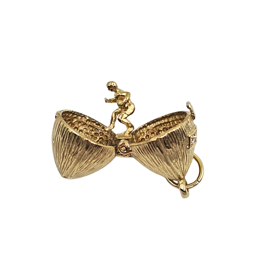 9ct Yellow Gold Cubic Zirconia Opening Rugby Ball Pendant