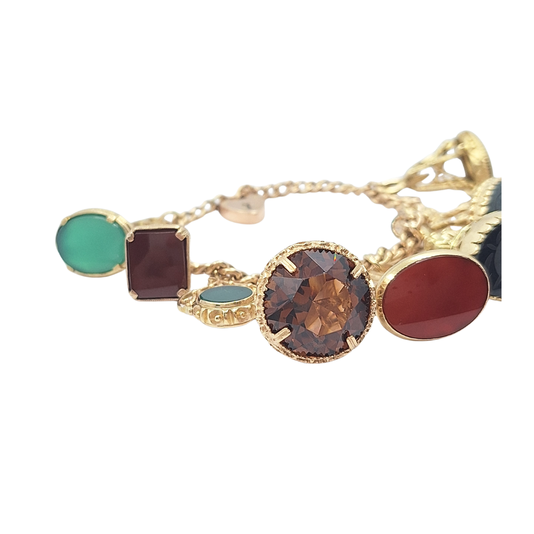 9ct Yellow Gold Charm Bracelet With Eight Fob Charms