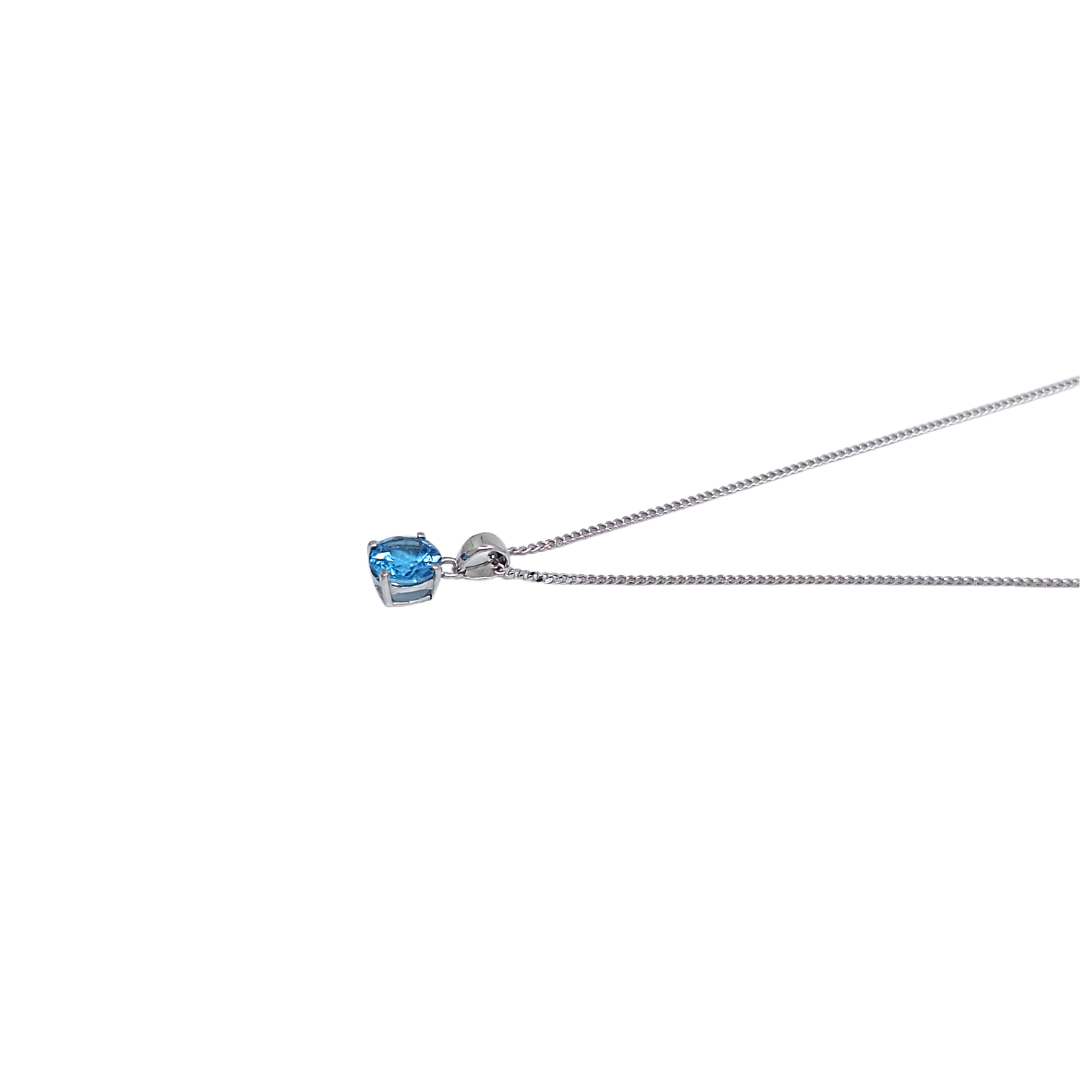 9ct White Gold Blue Topaz Pendant & Chain 18"