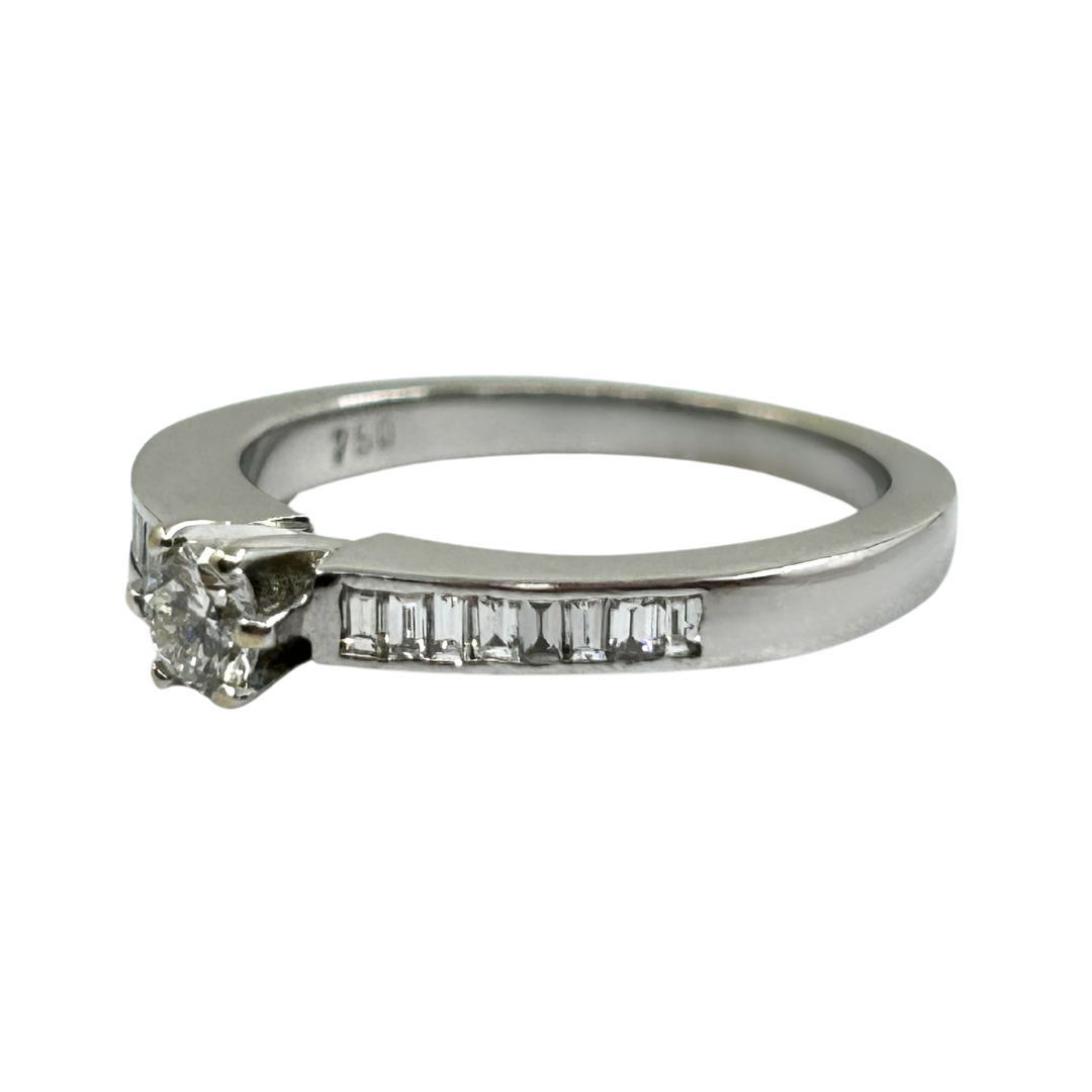 18ct White Gold Diamond Solitaire Ring With Baguette Diamond Shoulders