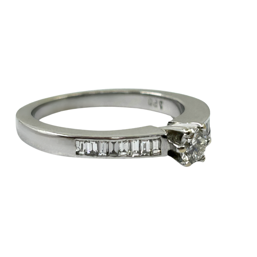 18ct White Gold Diamond Solitaire Ring With Baguette Diamond Shoulders