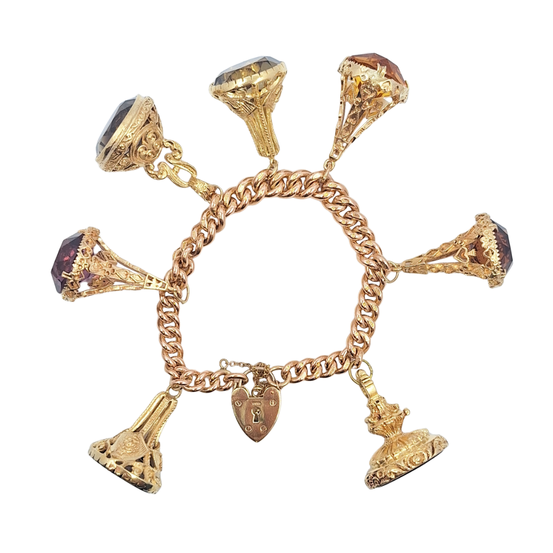 9ct Rose Gold Charm Bracelet With Yellow Gold Fob Charms